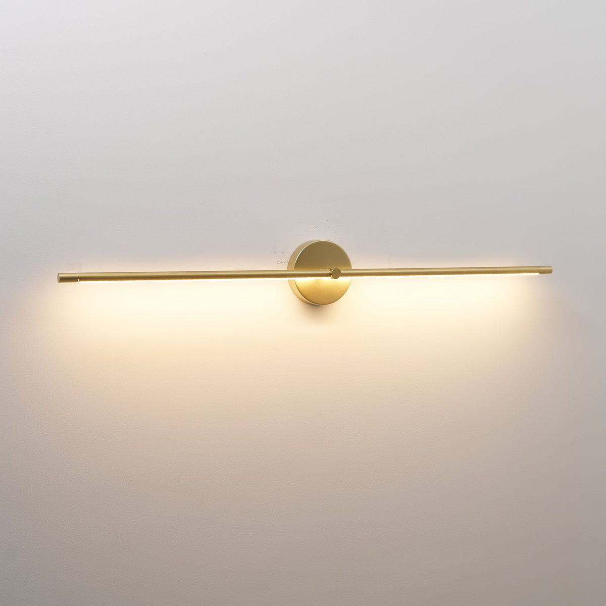 Linear LED Plug-In Wall Sconce with Metal Body and Warm Glow