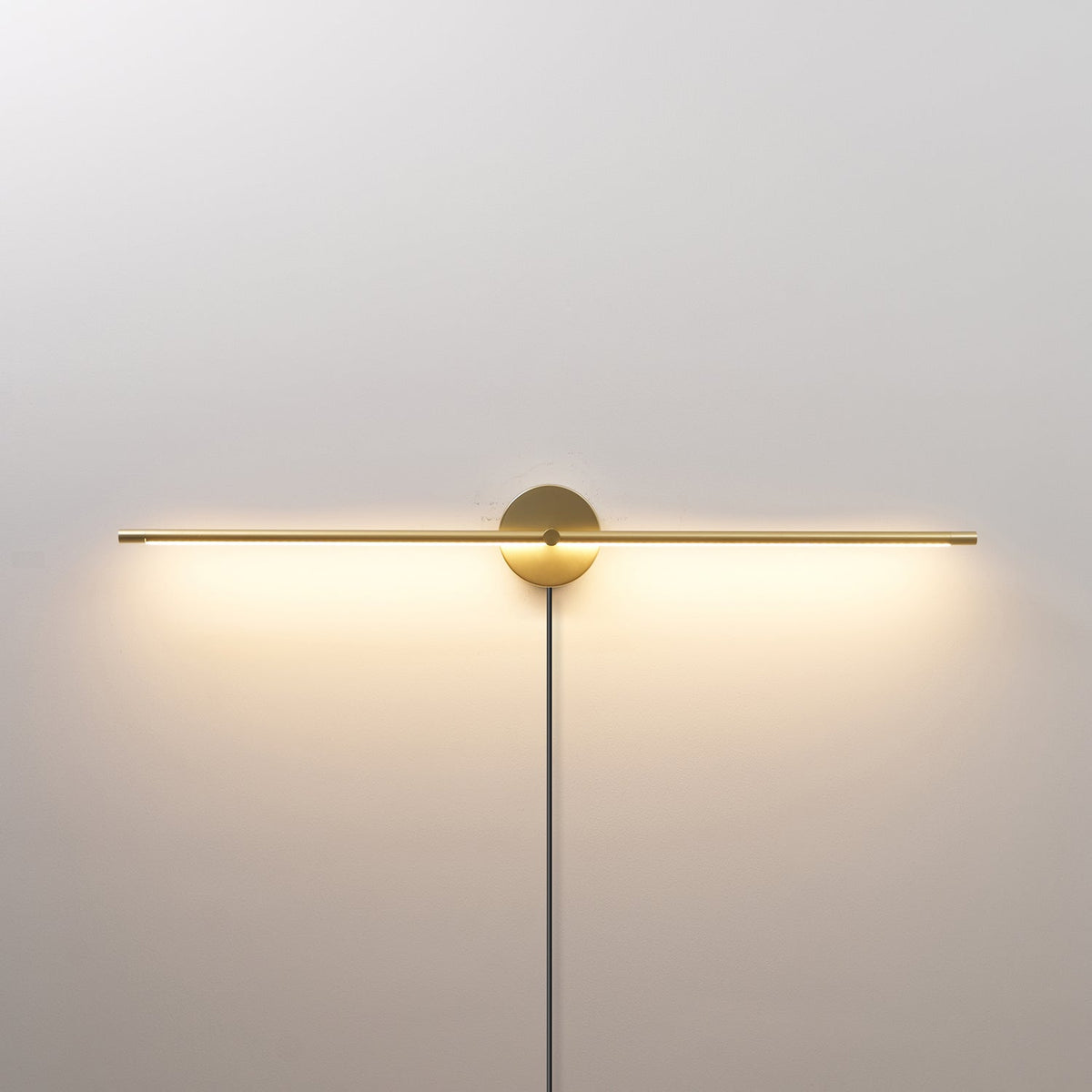 Linear LED Plug-In Wall Sconce with Metal Body and Warm Glow