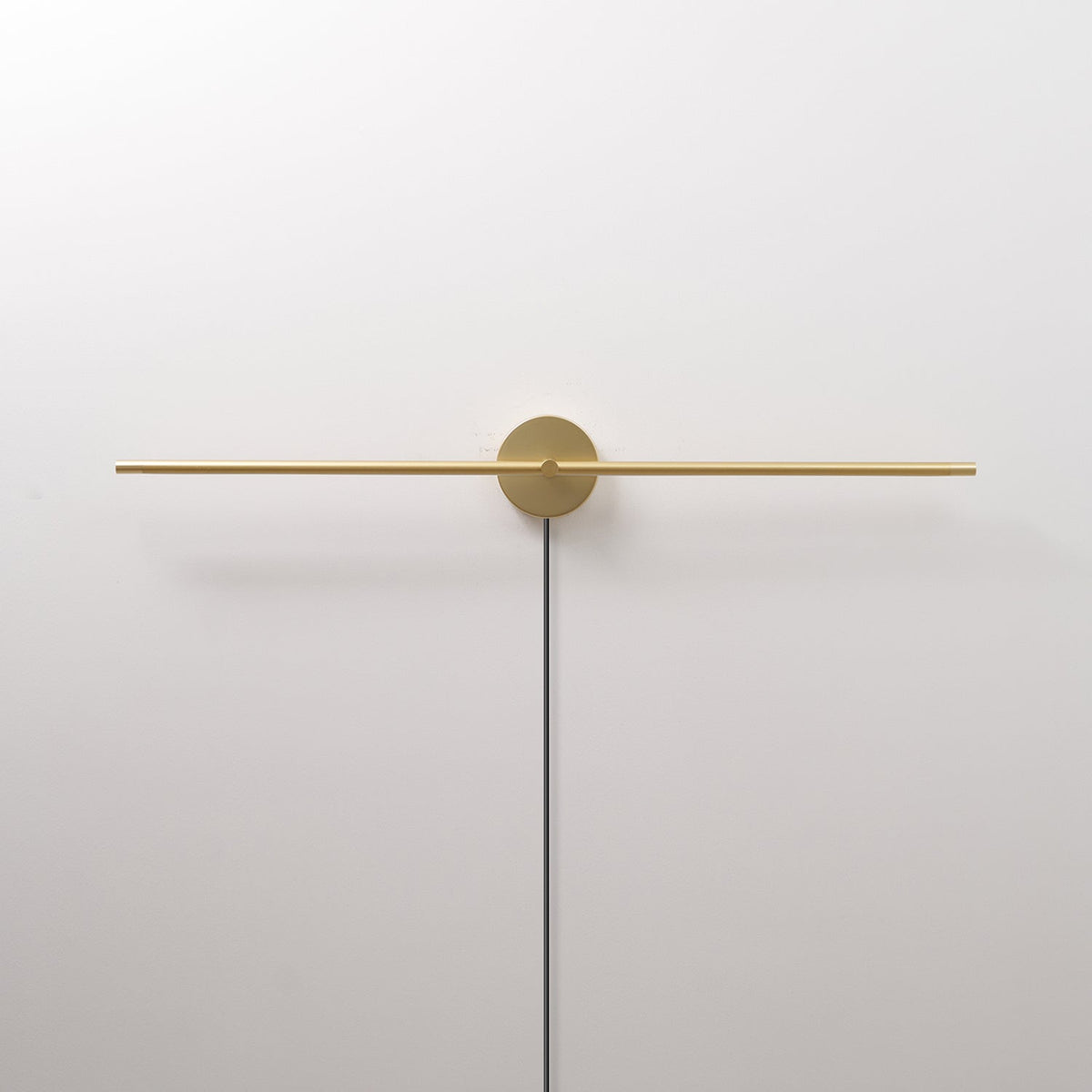 Linear LED Plug-In Wall Sconce with Metal Body and Warm Glow