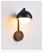 Morrow Dome Wall Sconce in Black Travertine with Opal Glass