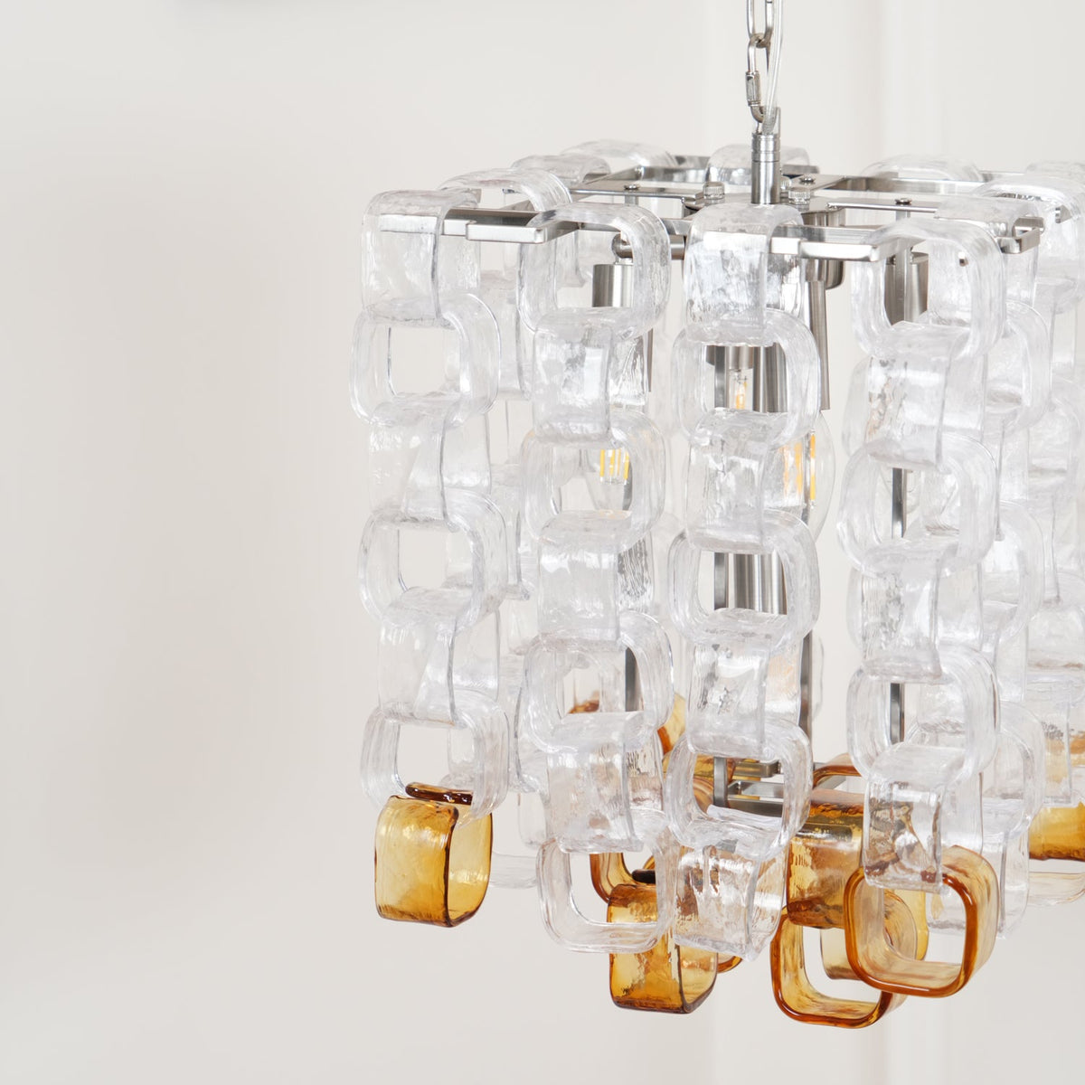 Interlocking Glass Chandelier with Amber Cups and Chrome Frame
