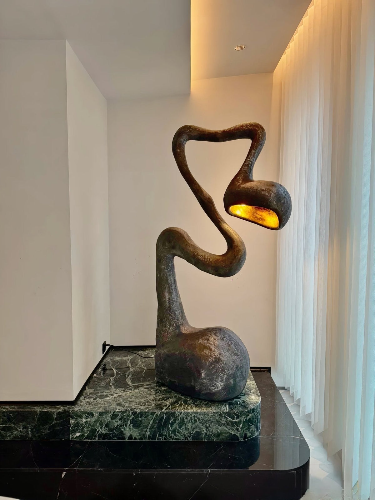 Myrrh Sculptural Floor Lamp in Matte Black with Gold Interior