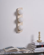 Elysian Travertine Wall Sconce with Glass Globes – Modern Natural Stone Lighting