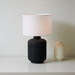 Nocturne Textured Black Ceramic Table Lamp with White Drum Shade