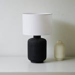 Nocturne Textured Black Ceramic Table Lamp with White Drum Shade