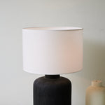 Nocturne Textured Black Ceramic Table Lamp with White Drum Shade