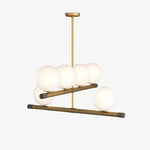 Nova Linear Chandelier – Modern Brass & Glass Pendant Light for Dining Room