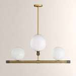 Nova Linear Chandelier – Modern Brass & Glass Pendant Light for Dining Room