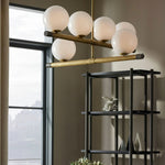 Nova Linear Chandelier – Modern Brass & Glass Pendant Light for Dining Room