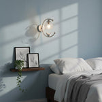 Nuvia Bird Wall Sconce in Brass and Glass | Designer Bedroom Lighting