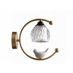 Nuvia Bird Wall Sconce in Brass and Glass | Designer Bedroom Lighting