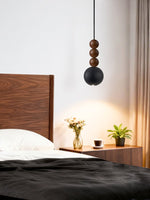 Orbio Sphere Pendant Light — Walnut & Black Travertine Ceiling Lamp