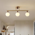 Orbis Quartet Linear Semi-Flush Ceiling Light in Brass and Walnut