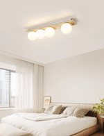 Orélie Modern Travertine Ceiling Light with Frosted Glass Globes