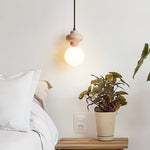 Orla Travertine Pendant Light – Sculptural Stone & Opal Glass
