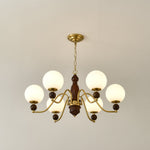 Ornate Heritage Chandelier – Wood & Brass Statement Lighting for Dining and Living Spaces