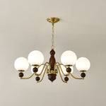 Ornate Heritage Chandelier – Wood & Brass Statement Lighting for Dining and Living Spaces