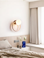 Orria Travertine Wall Sconce with Opaline Glass Globe