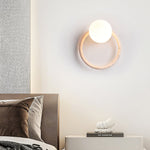Orria Travertine Wall Sconce with Opaline Glass Globe