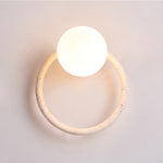 Orria Travertine Wall Sconce with Opaline Glass Globe