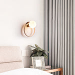 Orria Travertine Wall Sconce with Opaline Glass Globe
