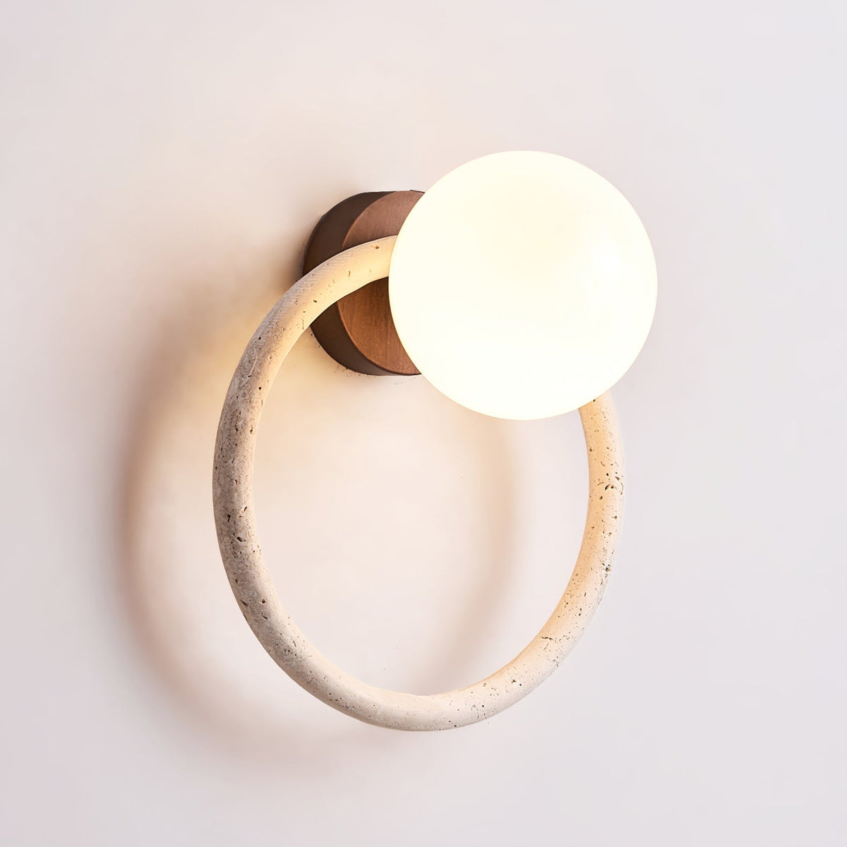 Orria Travertine Wall Sconce with Opaline Glass Globe