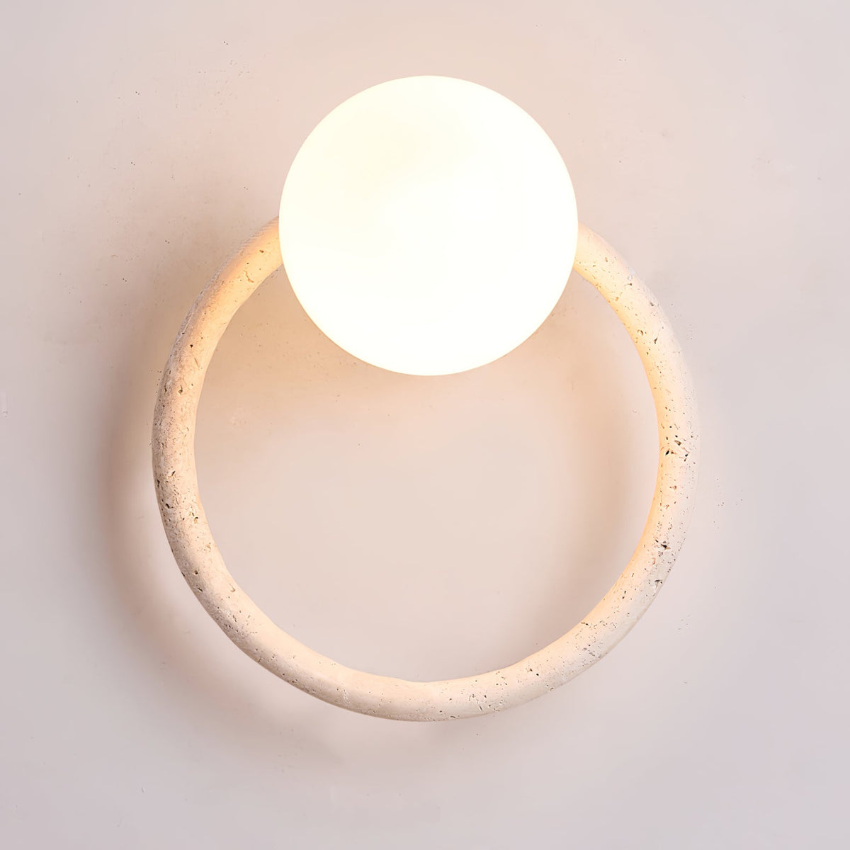 Orria Travertine Wall Sconce with Opaline Glass Globe