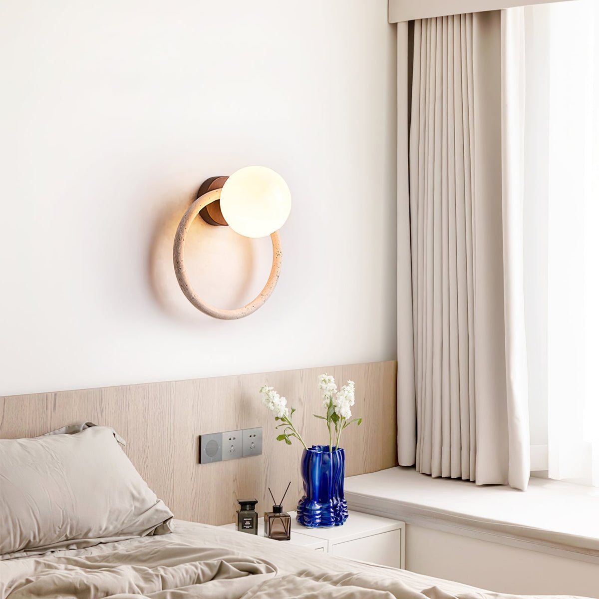 Orria Travertine Wall Sconce with Opaline Glass Globe