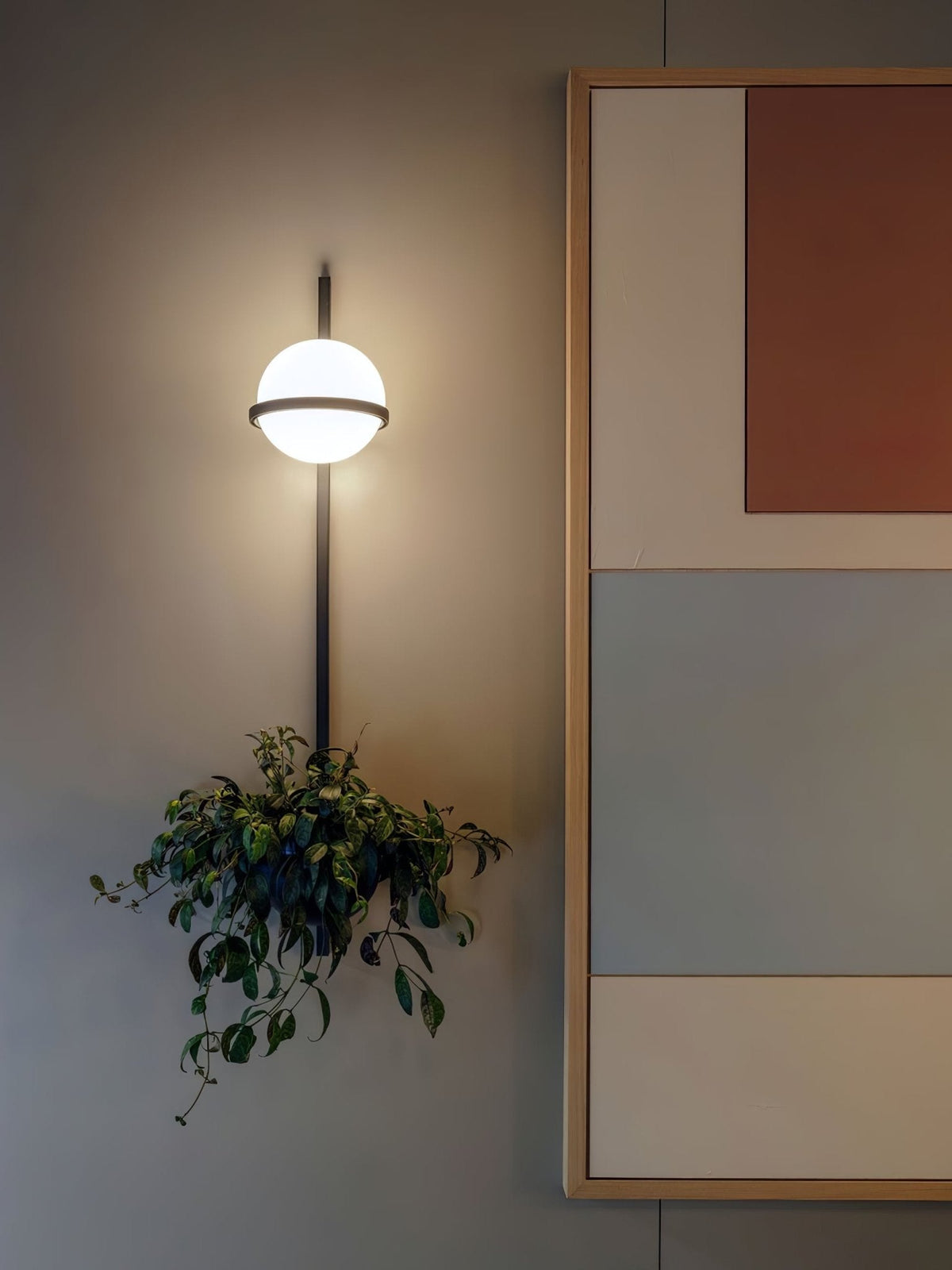Solstice Orb Wall Light – Modern LED Sconce for Indoor & Outdoor Spaces