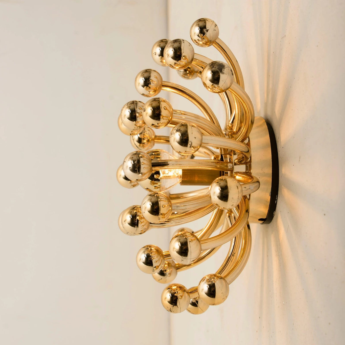 Pistillino Brass Wall Sconce – Modern Gold Orb Lighting Fixture