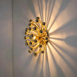 Pistillino Brass Wall Sconce – Modern Gold Orb Lighting Fixture