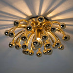 Pistillino Brass Wall Sconce – Modern Gold Orb Lighting Fixture