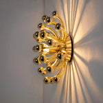 Pistillino Brass Wall Sconce – Modern Gold Orb Lighting Fixture