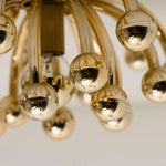 Pistillino Brass Wall Sconce – Modern Gold Orb Lighting Fixture