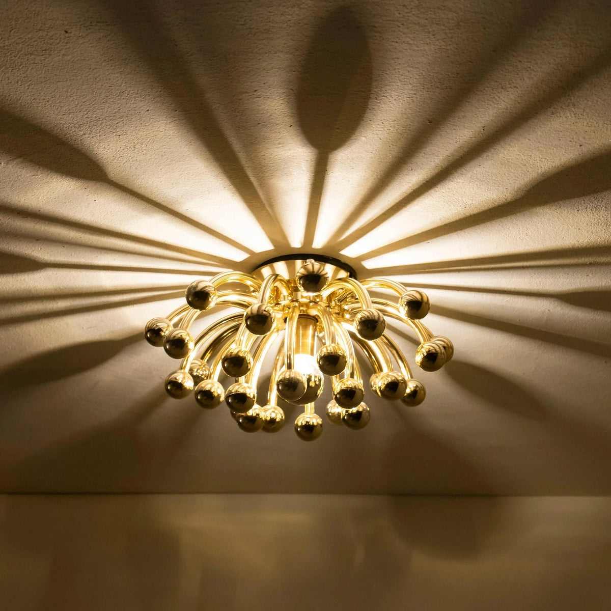 Pistillino Brass Wall Sconce – Modern Gold Orb Lighting Fixture