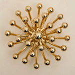 Pistillino Brass Wall Sconce – Modern Gold Orb Lighting Fixture