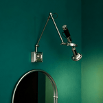 Precision Beam Adjustable Chrome Wall Sconce for Modern Interiors