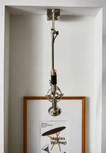 Precision Beam Adjustable Chrome Wall Sconce for Modern Interiors