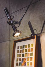Precision Beam Adjustable Chrome Wall Sconce for Modern Interiors