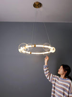 Puppet LED Chandelier in Gold and Clear Glass – Modern Luxury Pendant