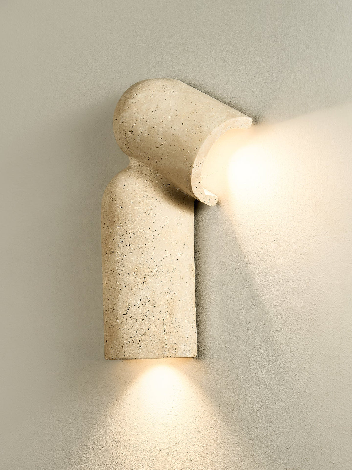 Selvian Sculptural Travertine Wall Sconce for Modern Interiors