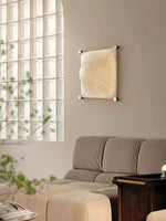 Serica Silk-Textured LED Wall Sconce for Modern Interiors
