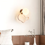 Serpentine Travertine Wall Sconce — Modern Organic Lighting for Hallways & Living Spaces