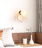 Serpentine Travertine Wall Sconce — Modern Organic Lighting for Hallways & Living Spaces