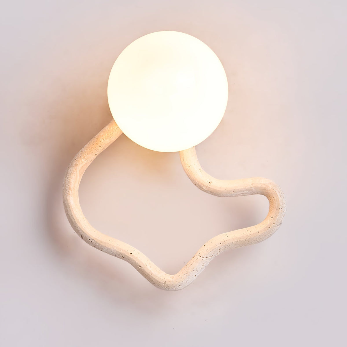 Serpentine Travertine Wall Sconce — Modern Organic Lighting for Hallways & Living Spaces