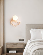 Serpentine Travertine Wall Sconce — Modern Organic Lighting for Hallways & Living Spaces
