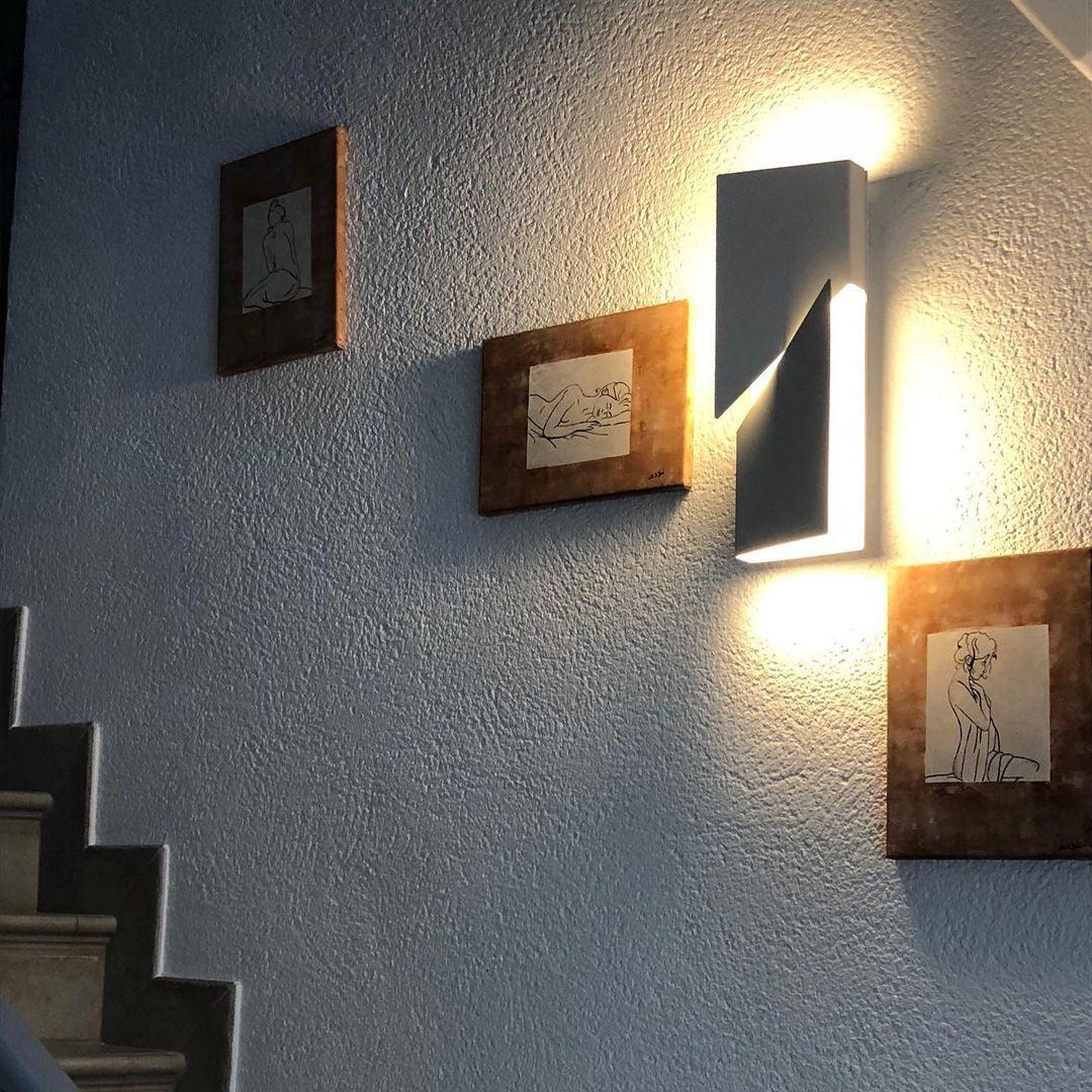 Shadows Charging Grand Sconce