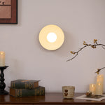 Solar Eclipse Brass Wall Sconce with Glass Shade for Modern Interiors