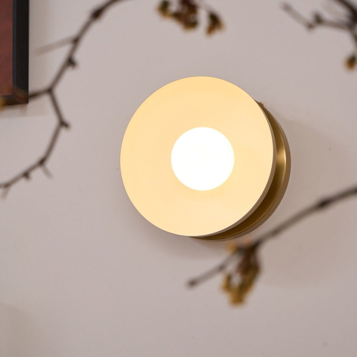 Solar Eclipse Brass Wall Sconce with Glass Shade for Modern Interiors