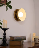 Solar Eclipse Brass Wall Sconce with Glass Shade for Modern Interiors